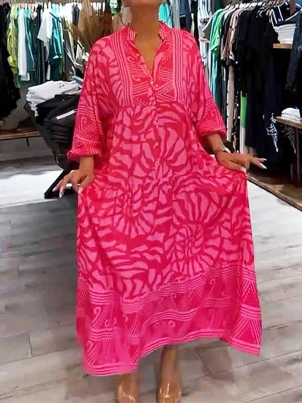 "Dalary - Flowy printed navy maxi dress with a v-neck, short sleeves, and cinched waist, suitable for all body types"