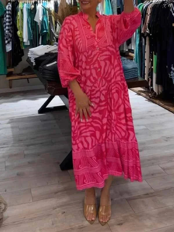 "Dalary maxi dress with a flowy silhouette and vibrant print suitable for all body types."