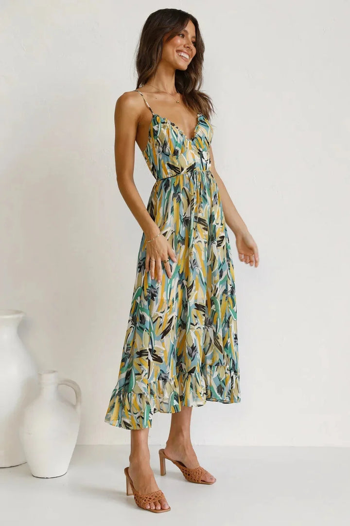 "Vibrant print flowy maxi dress by Dearra, featuring a lightweight, airy fabric perfect for a fashionable, effortless summer…