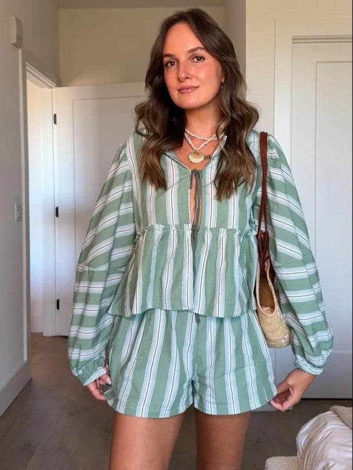 Green striped shorts and blouse summer outfit featuring lightweight cotton blend fabric and trendy striped design. Perfect…