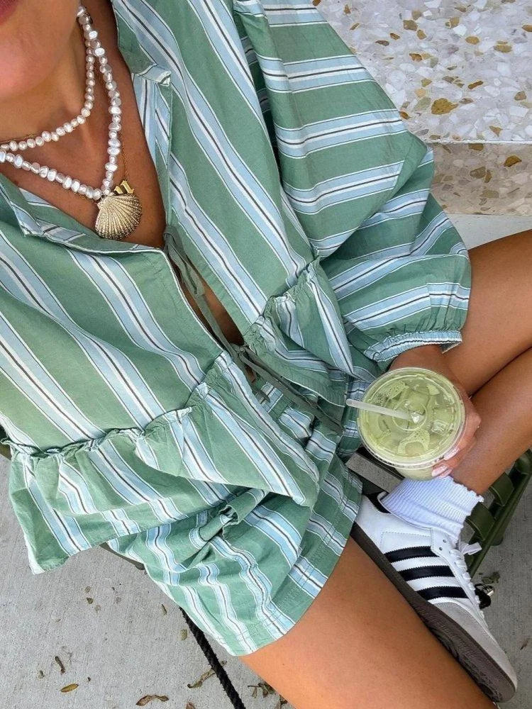 Green striped linen shorts and matching blouse summer outfit set by Delilah, perfect for a casual yet chic look.