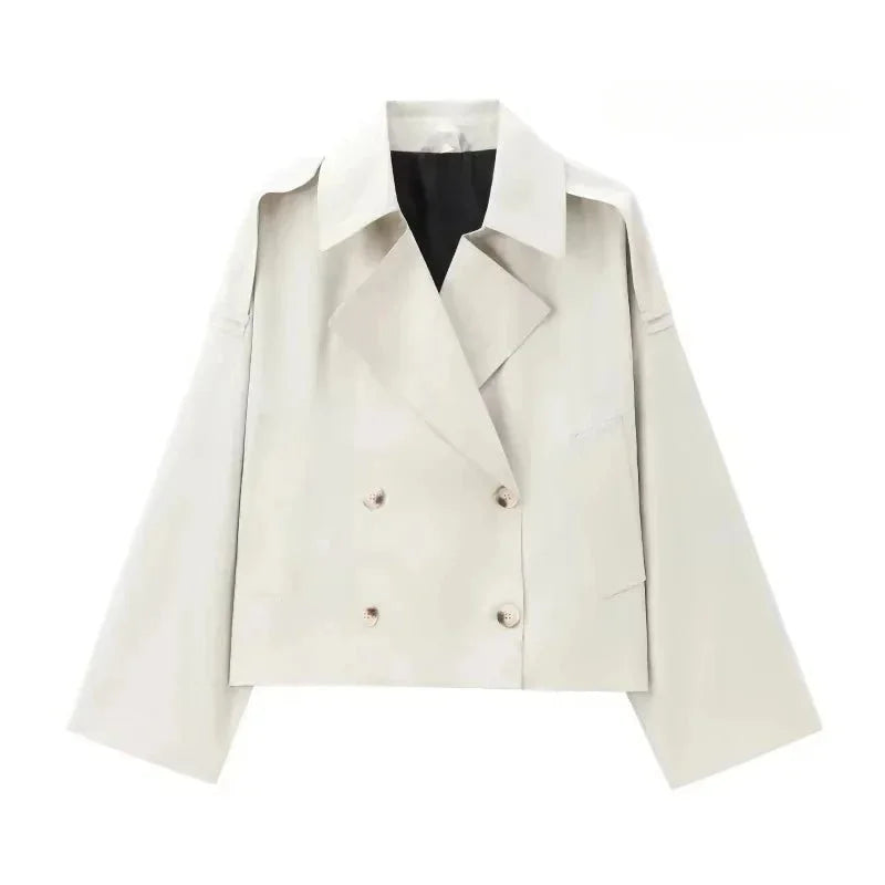 Ivory double-breasted jacket, structured design with a tailored fit, ideal for formal occasions or office wear, crafted with…