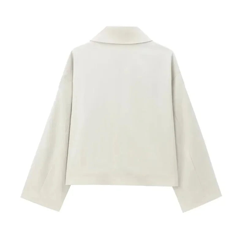 Ivory double-breasted jacket with structured design, ideal for elevating your outfit.