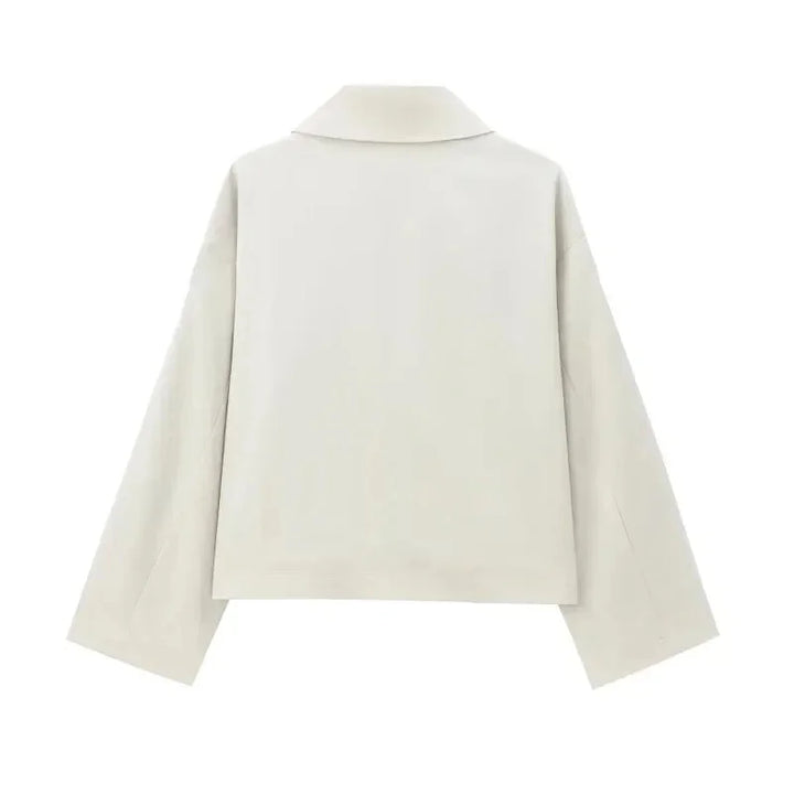 Ivory double-breasted jacket with structured design, ideal for elevating your outfit.