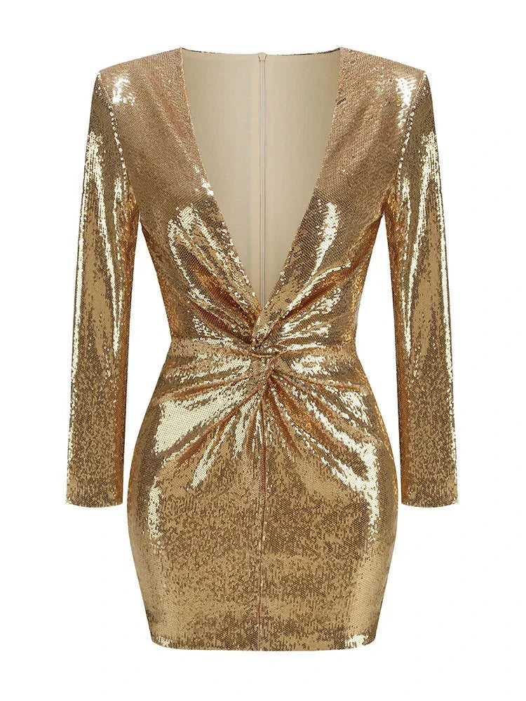 "Shimmering gold sequined mini dress with long sleeves, perfect for a glamorous night out."