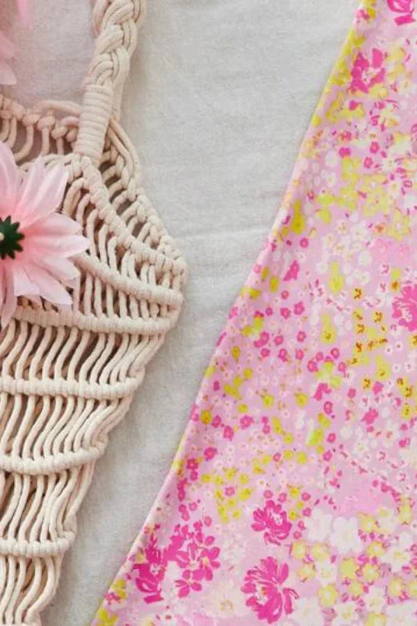 Pink floral cut-out maxi dress with a delicate design ideal for casual outings or special events.