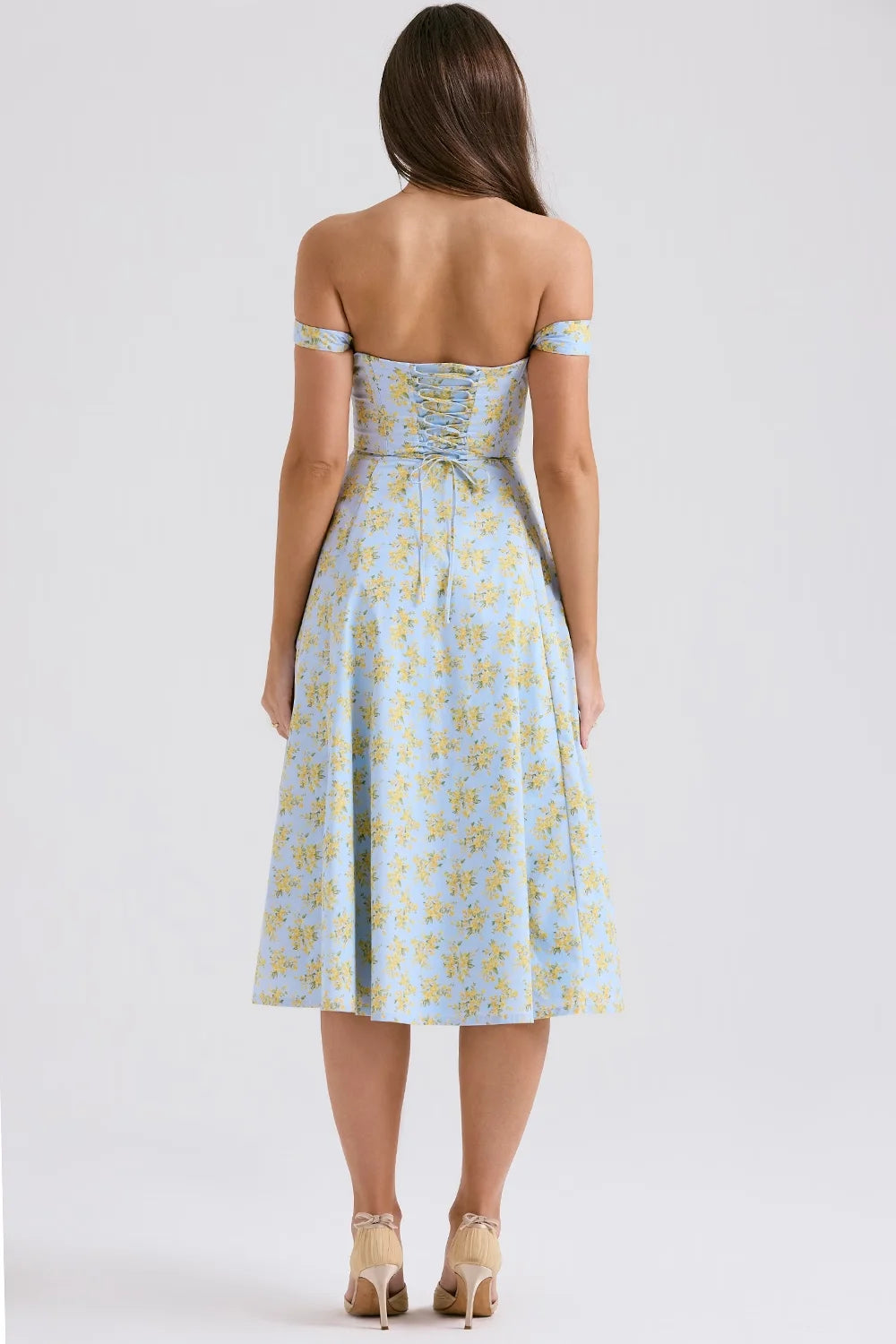 Floral midi dress made with quality fabric, featuring shapely seams for a flattering silhouette.
