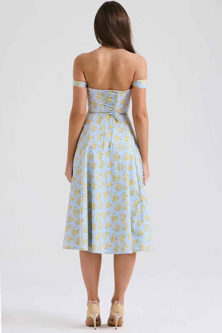 Floral midi dress made with quality fabric, featuring shapely seams for a flattering silhouette.