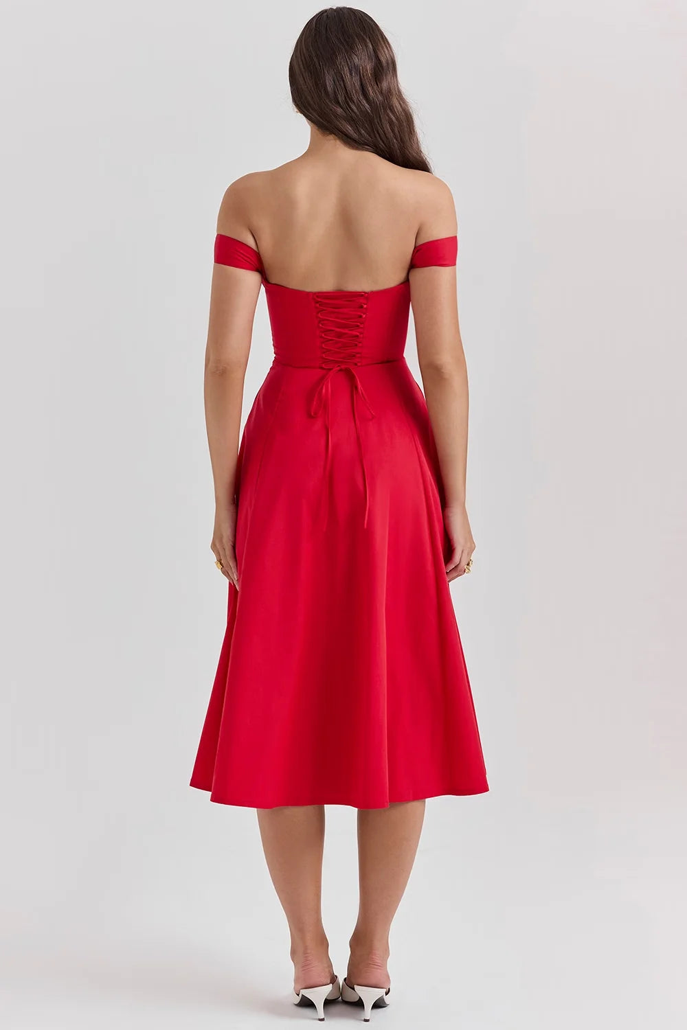 Floral midi dress with shapely seams, featuring a dreamy floral print and structured silhouette.