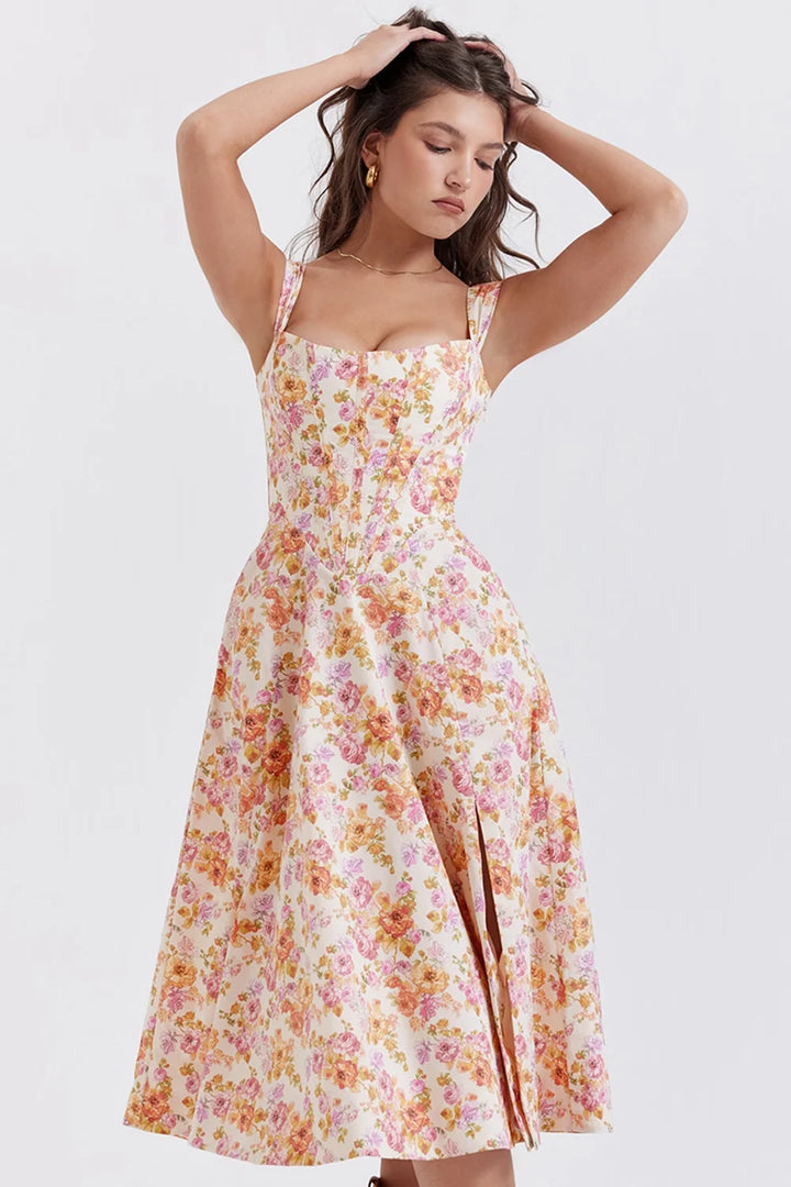 Floral midi dress with shapely seams, featuring a dreamy design perfect for any occasion.
