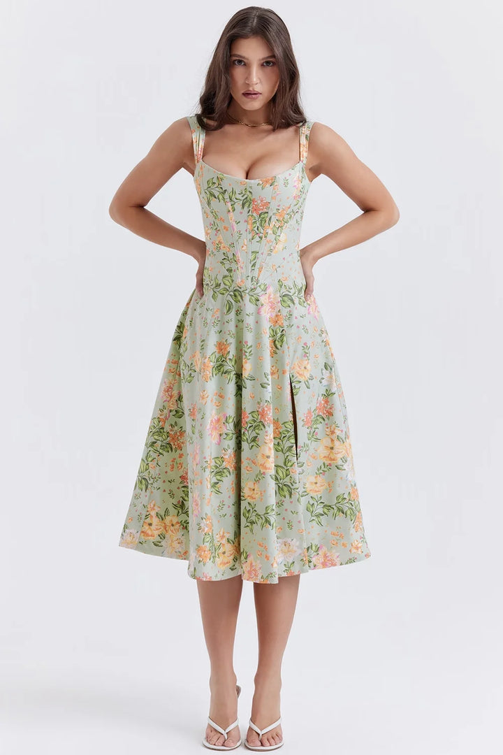 "Green floral midi dress with shapely seams, perfect for a stylish and chic look, ideal for a casual outing or special…