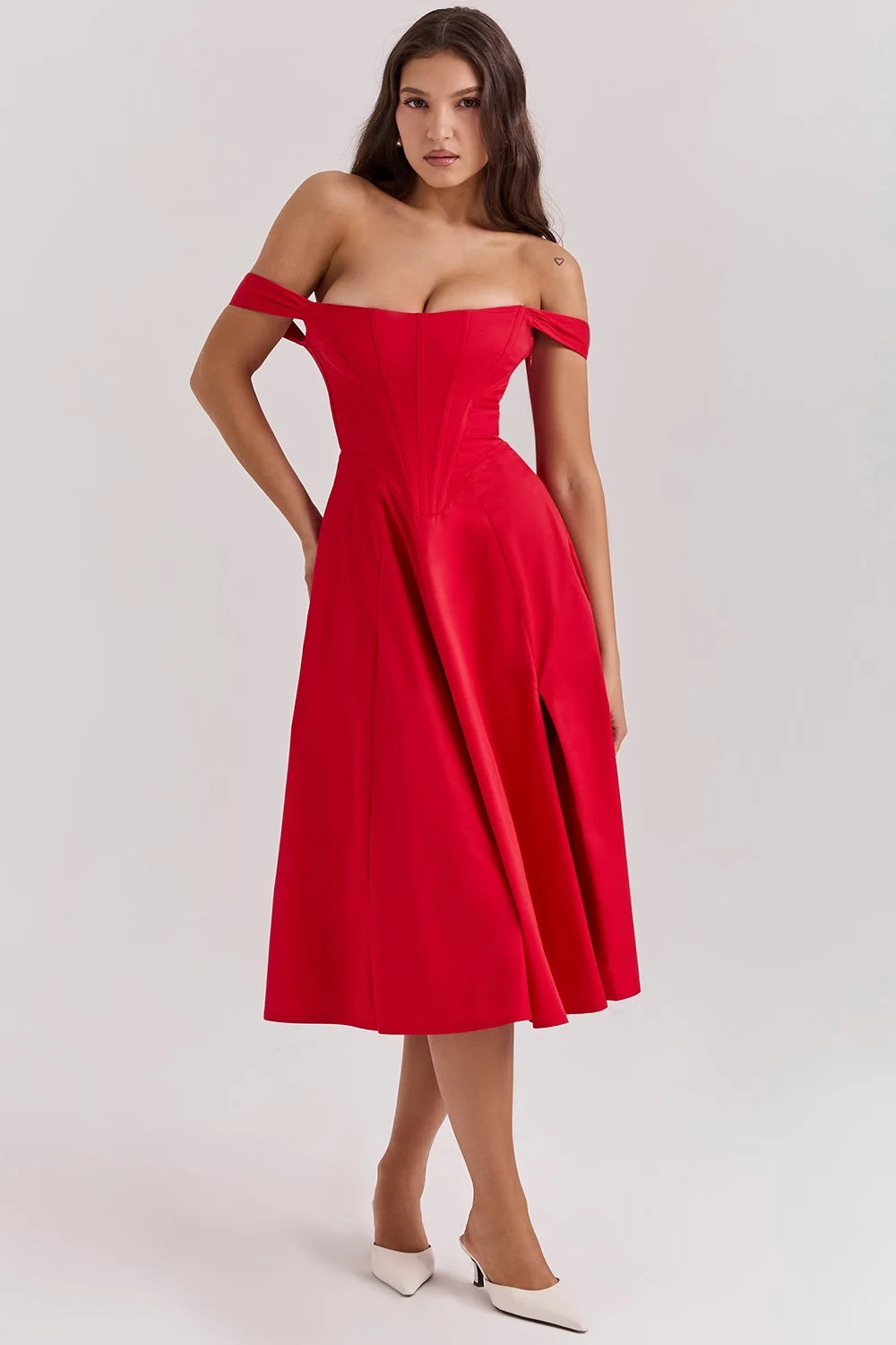Red midi dress with shapely seams, featuring a vibrant floral pattern. Made from lightweight, breathable fabric for all-day…