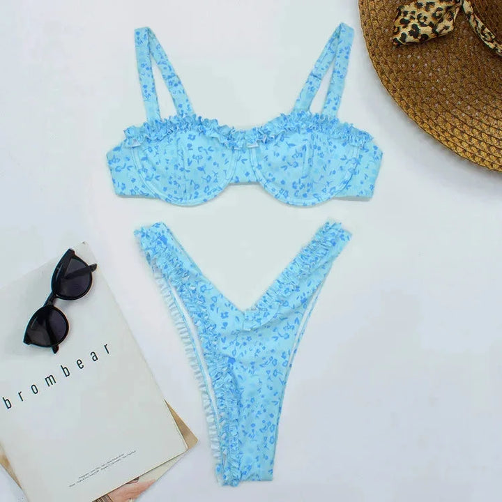 "Women's ruffled bikini with matching bottoms in vibrant floral print, perfect for poolside fun and beach outings."