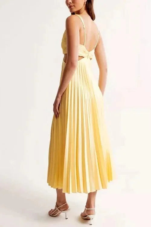 "Black midi dress featuring pleats and cut-out accents, perfect for stylish occasions."