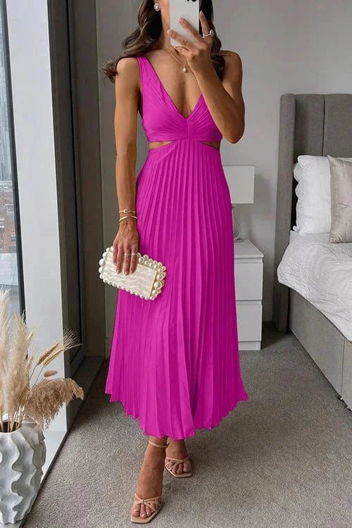 Pink pleated midi dress with cut-out accents from Easton. Feminine and elegant design perfect for special occasions.