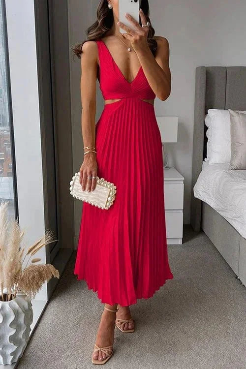 Red pleated midi dress with cut-out accents by Easton, featuring a sophisticated and elegant design perfect for any special…
