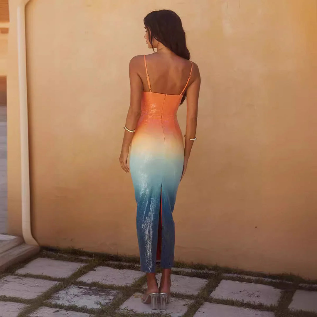 Ombre midi dress in shades of sunset with starfish embellishments, ideal for beach outings or casual events.