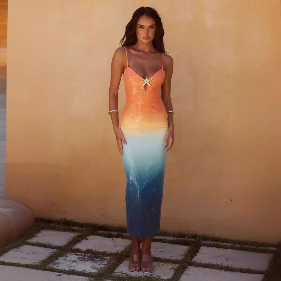 "Eisley midi dress with sunset ombre design and starfish detail, perfect for summer days at the beach"