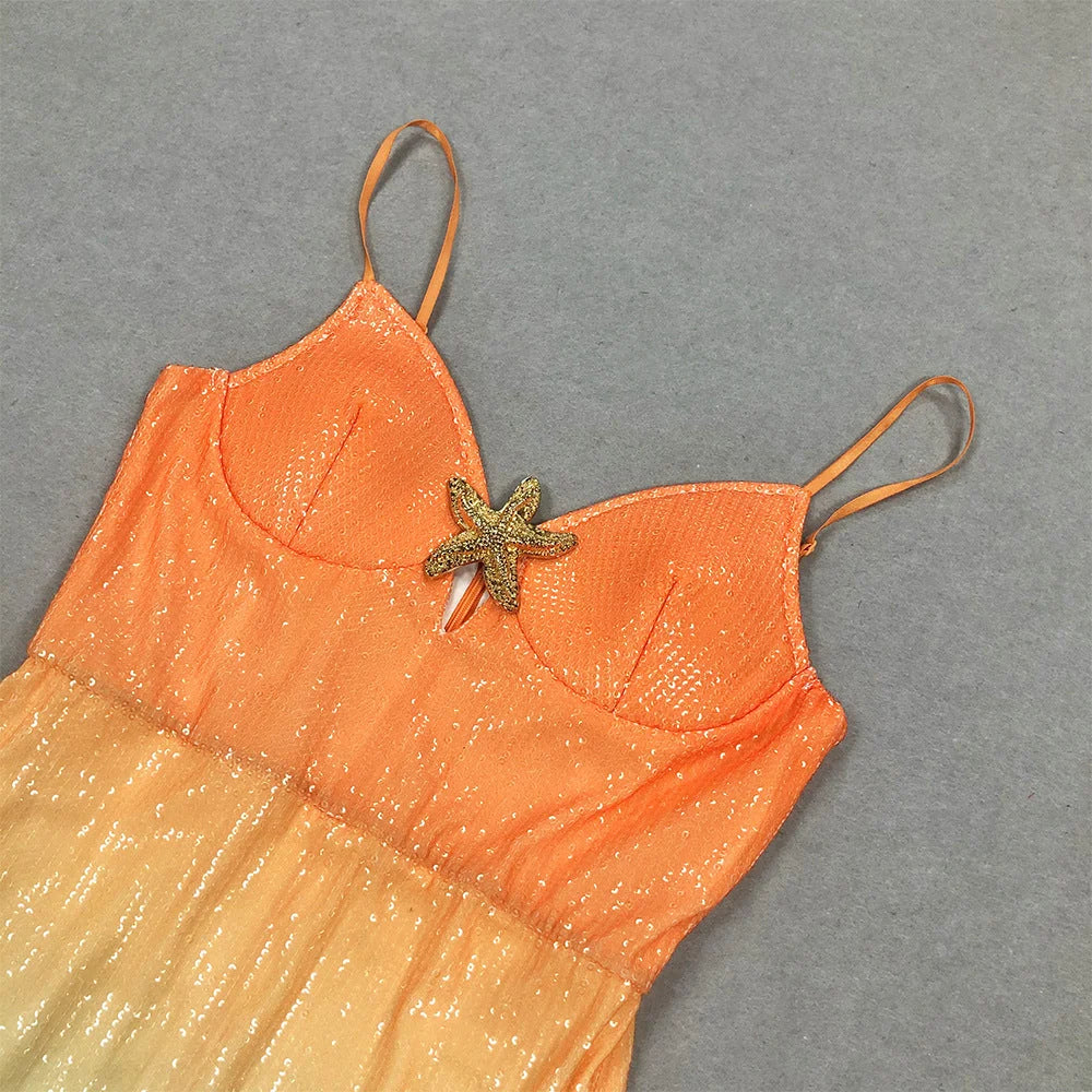 "Eisley midi dress featuring a beautiful sunset ombre design with starfish details, perfect for a beach day or casual…