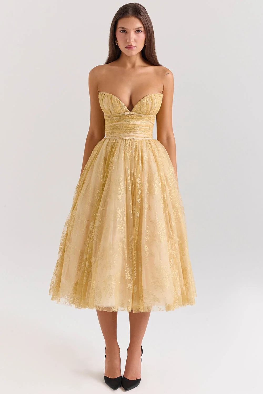 "Strapless gold floral mid-length dress, featuring a stunning floral design, perfect for special occasions or formal events."