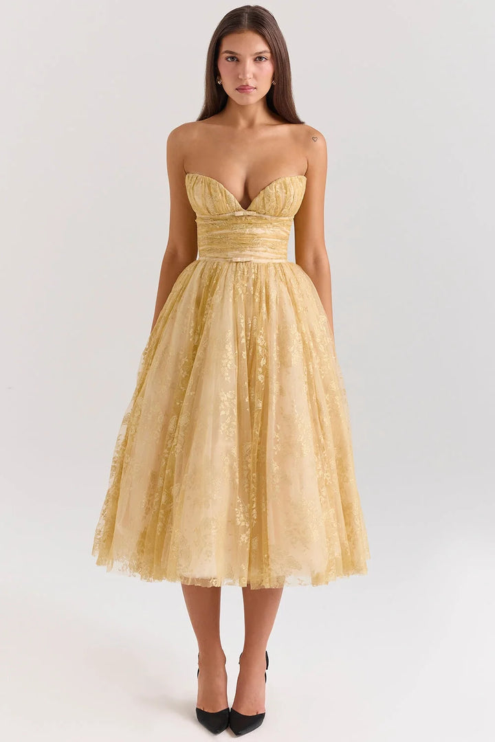 "Strapless gold floral mid-length dress, featuring a stunning floral design, perfect for special occasions or formal events."