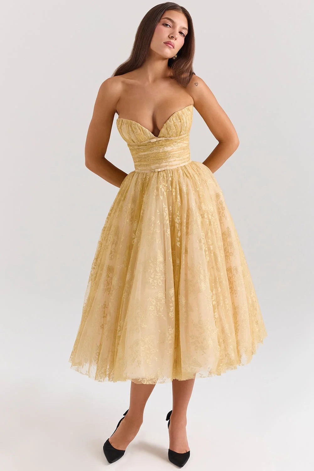 Strapless golden floral mid-length dress in Colour showcasing elegant floral pattern, versatile for various occasions.