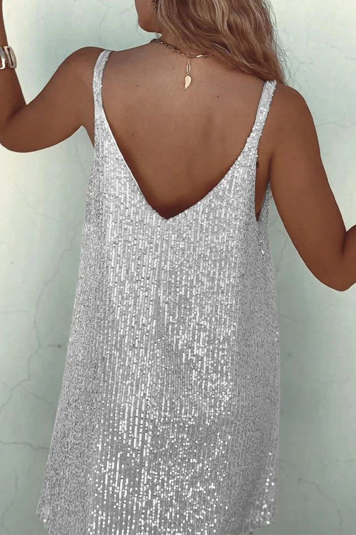 Black sleeveless romper with V-neck and sequin detailing. Perfect for a night out or special occasion.