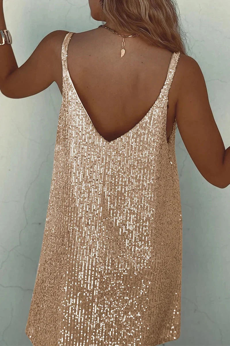 A stylish sleeveless romper with a V-neck, adorned with shimmering sequins, perfect for a special occasion.