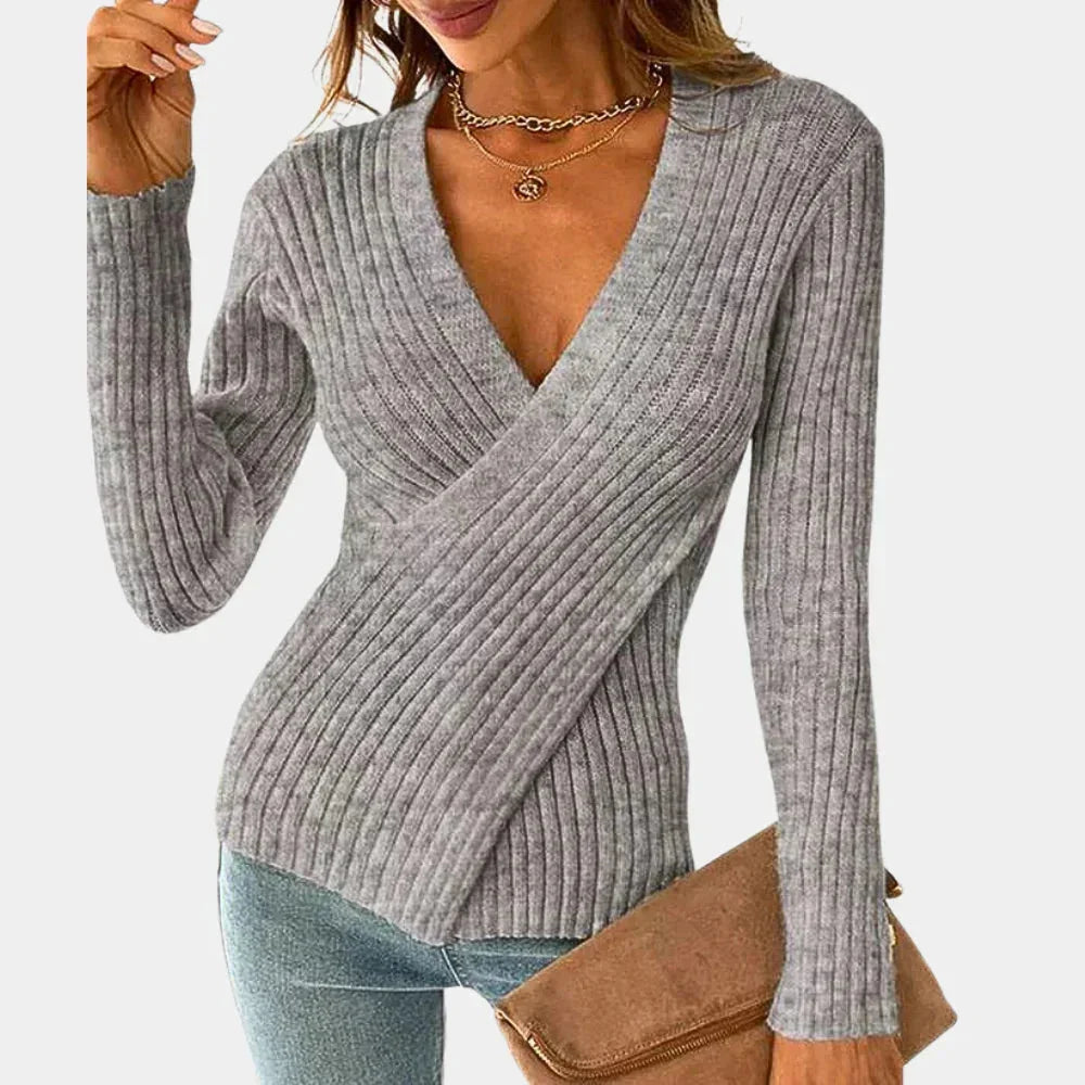 Grey Ribbed V-neck wrap top with a flattering silhouette, made from soft and stretchy fabric for a comfortable and stylish…