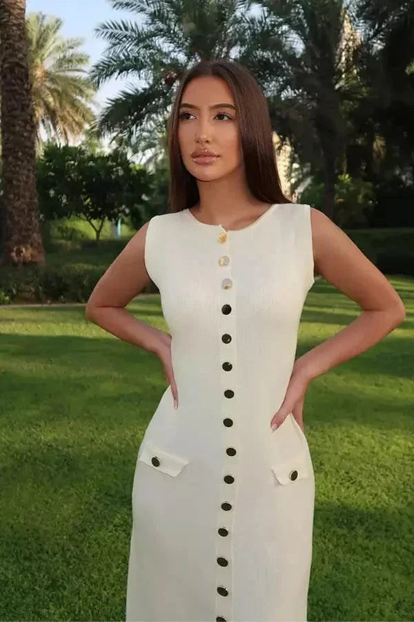 Ellerie sleeveless maxi dress with button detail and a flowing silhouette perfect for warm weather outings.