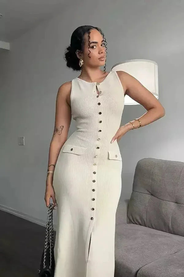 Sleeveless button detail maxi dress in a soft, flowing fabric with a flattering silhouette.