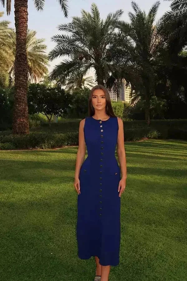 Sleeveless button detail maxi dress in a muted grey tone, made from lightweight, flowy fabric.