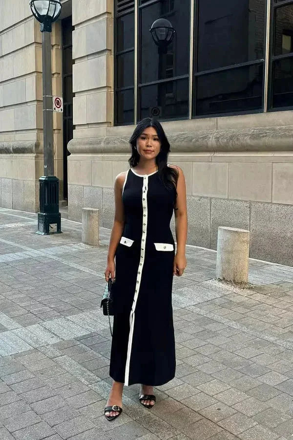 Sleeveless black maxi dress with button detail, made from soft, comfortable fabric perfect for casual outings or semi-formal…