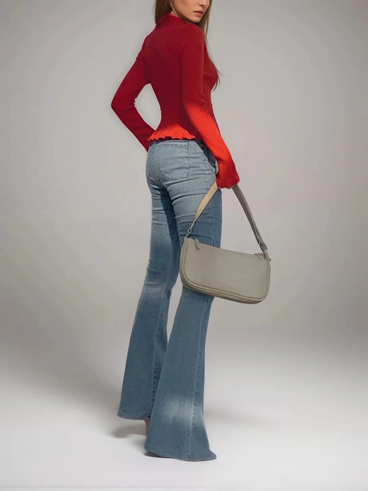 Knit ribbed cardigan with chic front buttons, ideal for layering in cooler weather.