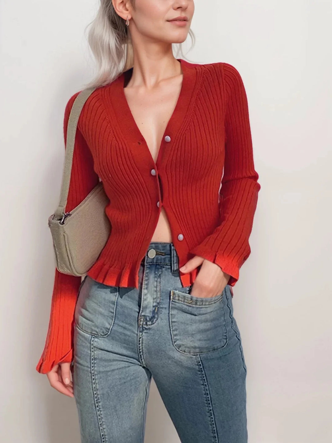 Red ribbed cardigan with stylish front buttons. Made from soft knit fabric that offers both comfort and style for everyday…