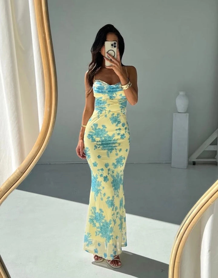 "Sleeveless yellow maxi dress with slim fit silhouette, ideal for a casual yet stylish look."