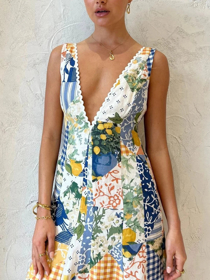 "Sleeveless maxi dress with patchwork design in soft cotton fabric, perfect for casual outings and warm weather occasions."