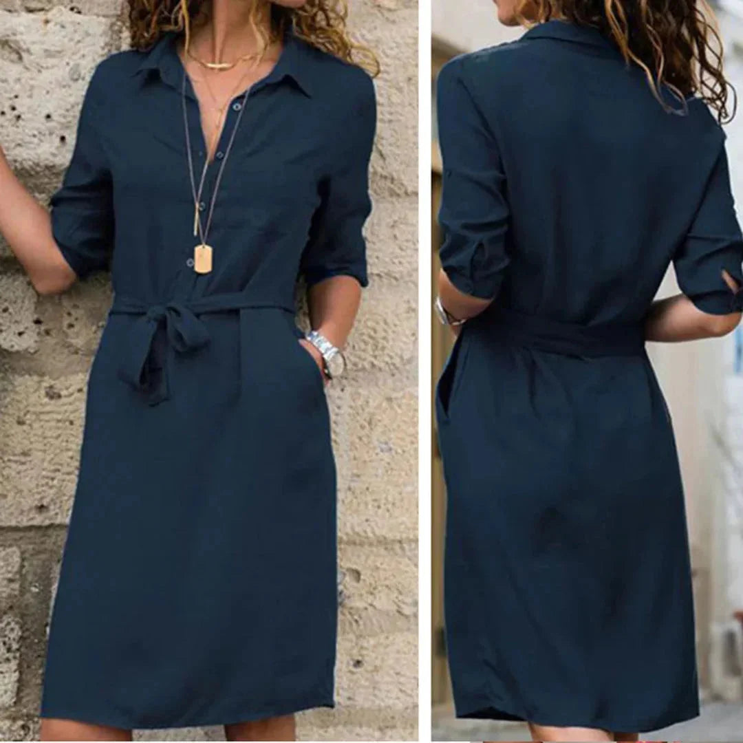 Belted shirt dress in navy blue with a tailored fit, made of lightweight cotton blend fabric, featuring a pointed collar and…