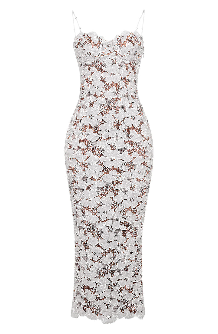 White floral lace spaghetti strap dress showcasing intricate lace details and delicate design.