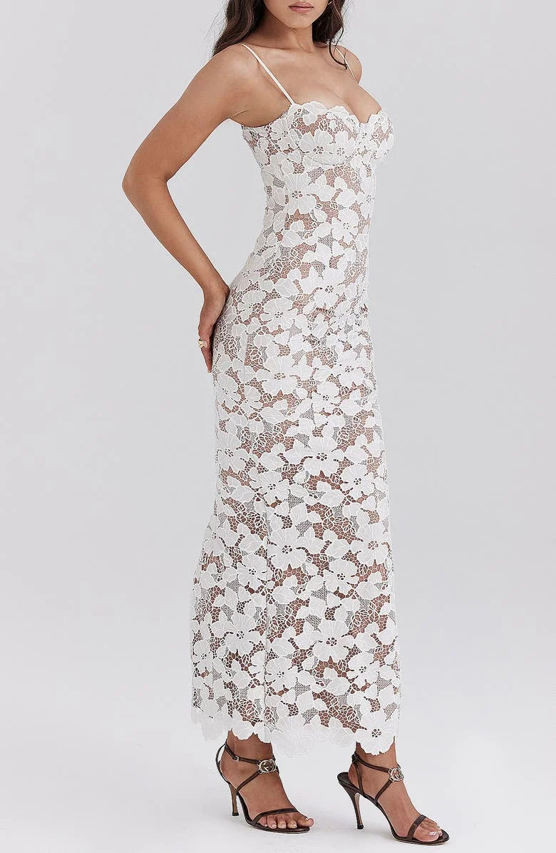 White floral lace spaghetti strap dress with intricate lace detailing and a flattering silhouette.
