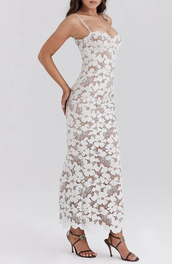White floral lace spaghetti strap dress with intricate lace detailing and a flattering silhouette.