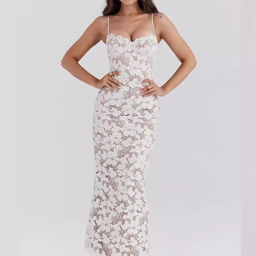 White floral lace spaghetti strap dress with elegant detailing for a feminine and chic look, perfect for any occasion.