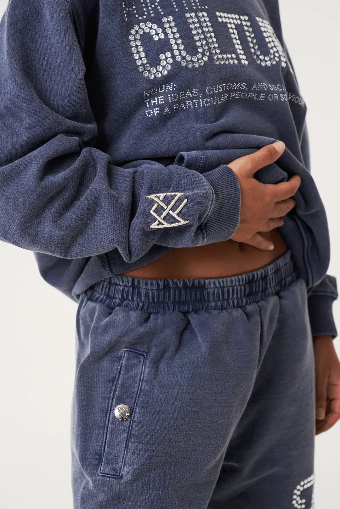 "Navy unisex hoodie featuring a bold statement print, made with soft and durable material."