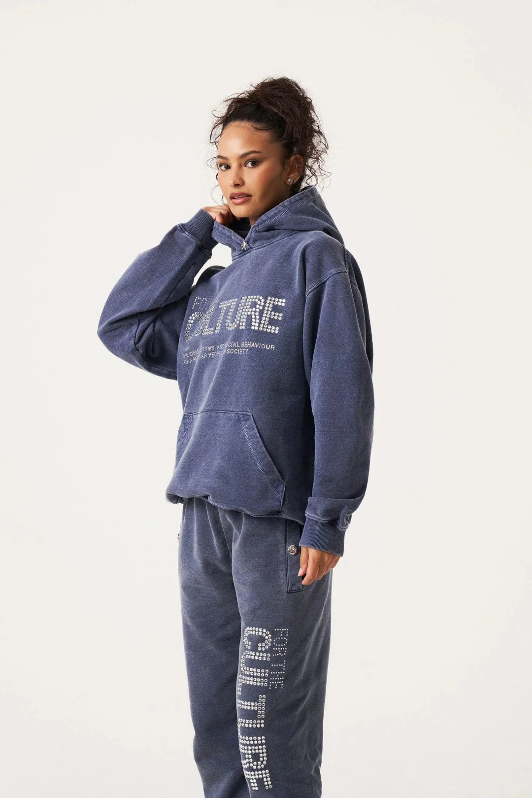 "Navy unisex hoodie with statement print, made from soft organic cotton, perfect for casual everyday wear."
