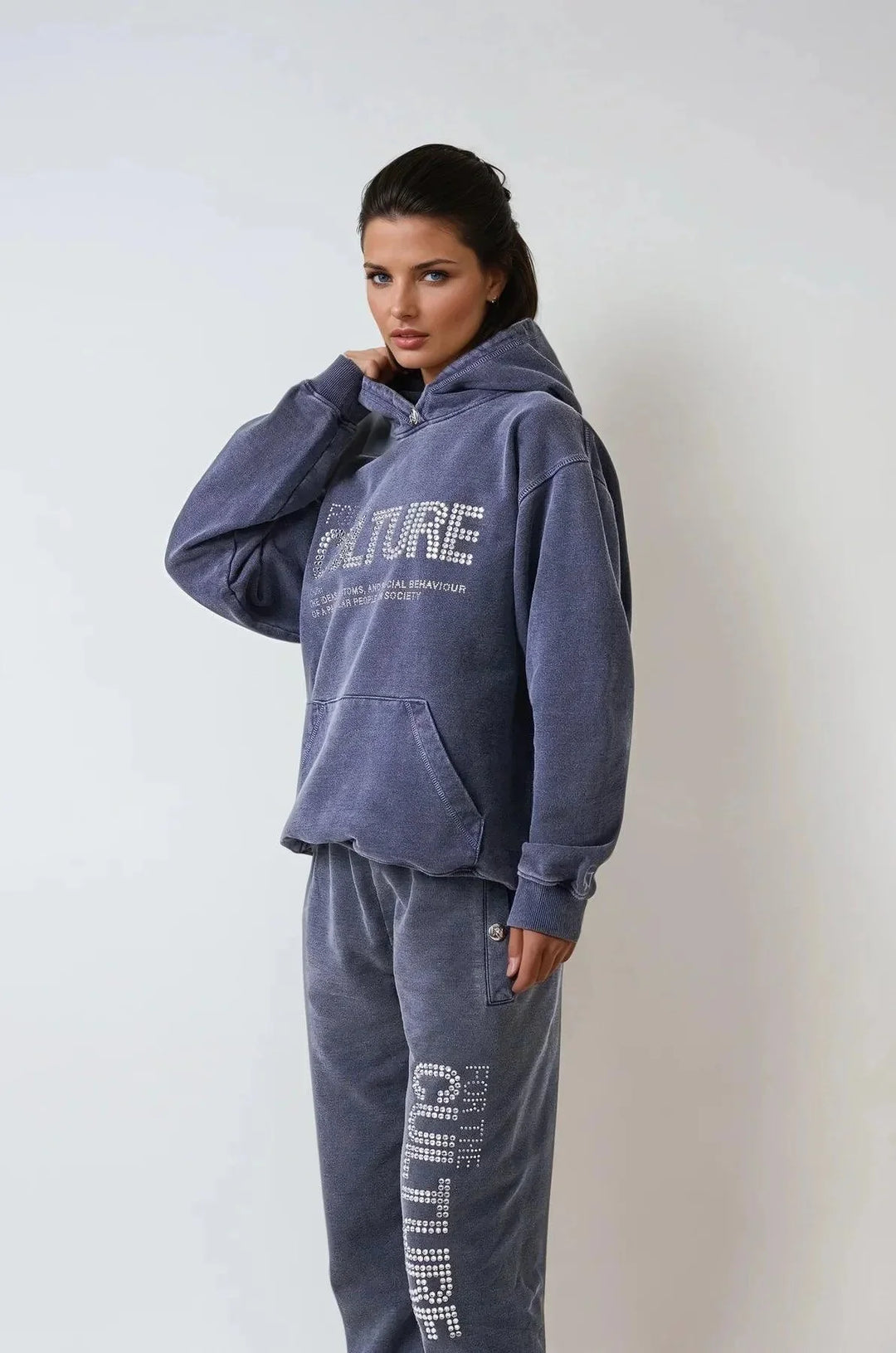 "Navy unisex hoodie with statement print, made of soft cotton blend, perfect for casual wear and cozy evenings."