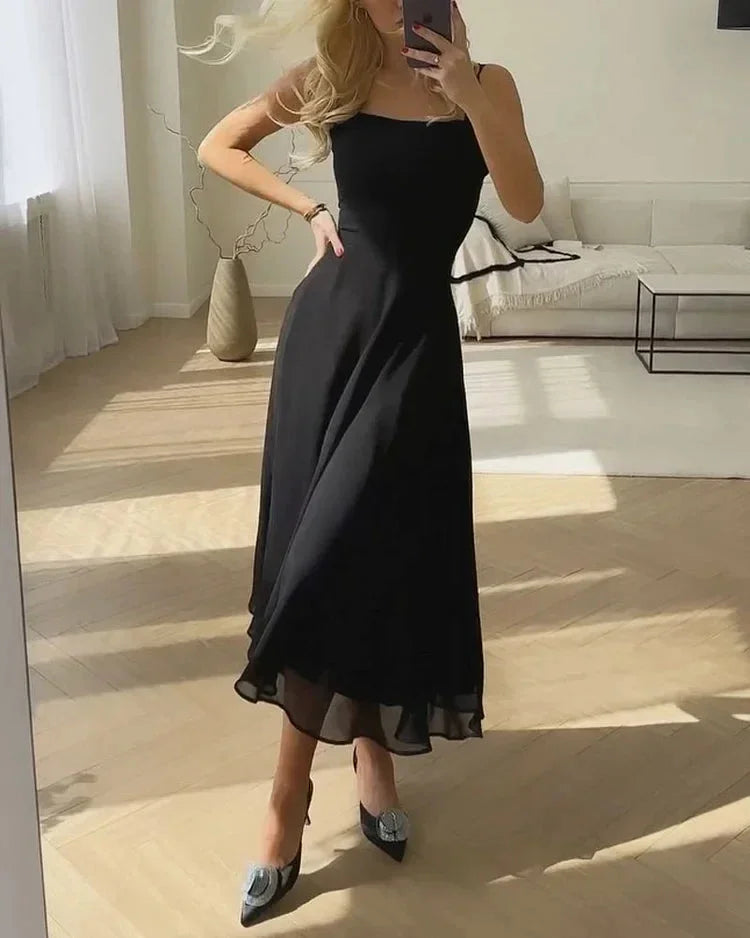 Black square neckline midi dress with fitted bodice. Featuring a textured weave fabric and figure-flattering silhouette.
