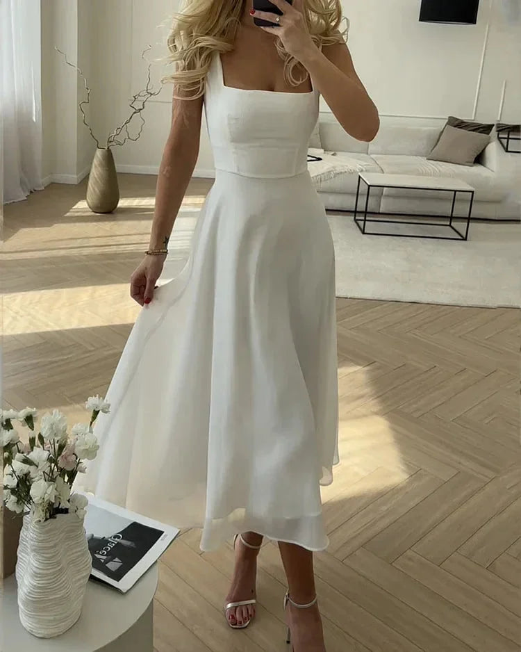 "Black square neck midi dress with fitted bodice and sleek silhouette"