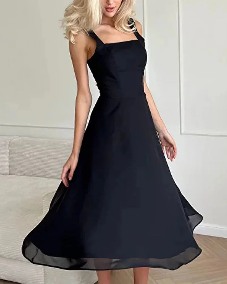 Black square neckline midi dress with fitted bodice, featuring a structured silhouette in a textured fabric with elegant…