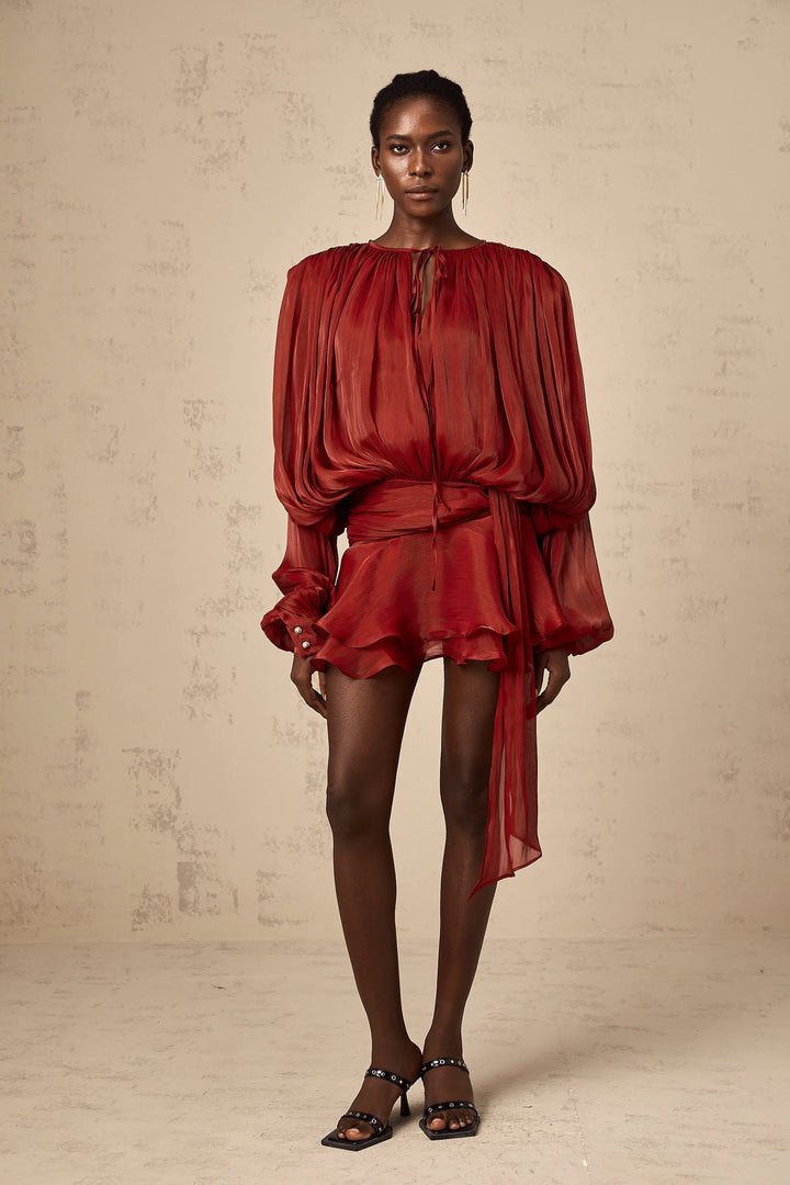 Satin mini dress with tie accents in flowing design, perfect for special occasions or a night out.
