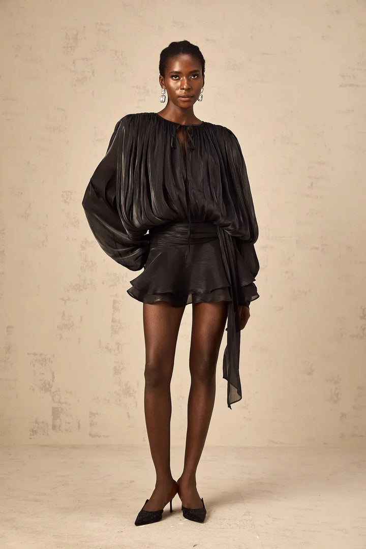 "Gabriella satin mini dress with tie accents in flowing design. Soft and elegant, perfect for any occasion."
